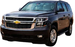 Domestic Vehicle Repair In Sterling, VA At Honest Tom Care. A dark Chevrolet Tahoe SUV.