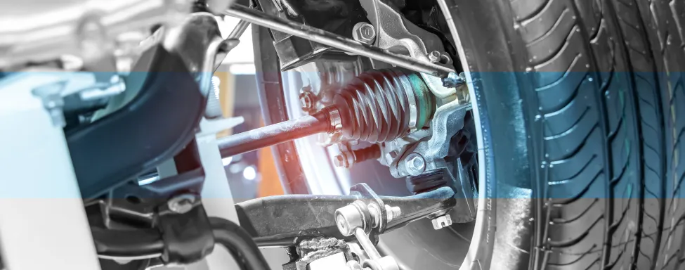Steering & Suspension Repair In Sterling, VA At Honest Tom Care. A detailed shot of a car's steering and suspension components, possibly showing a repair in progress.